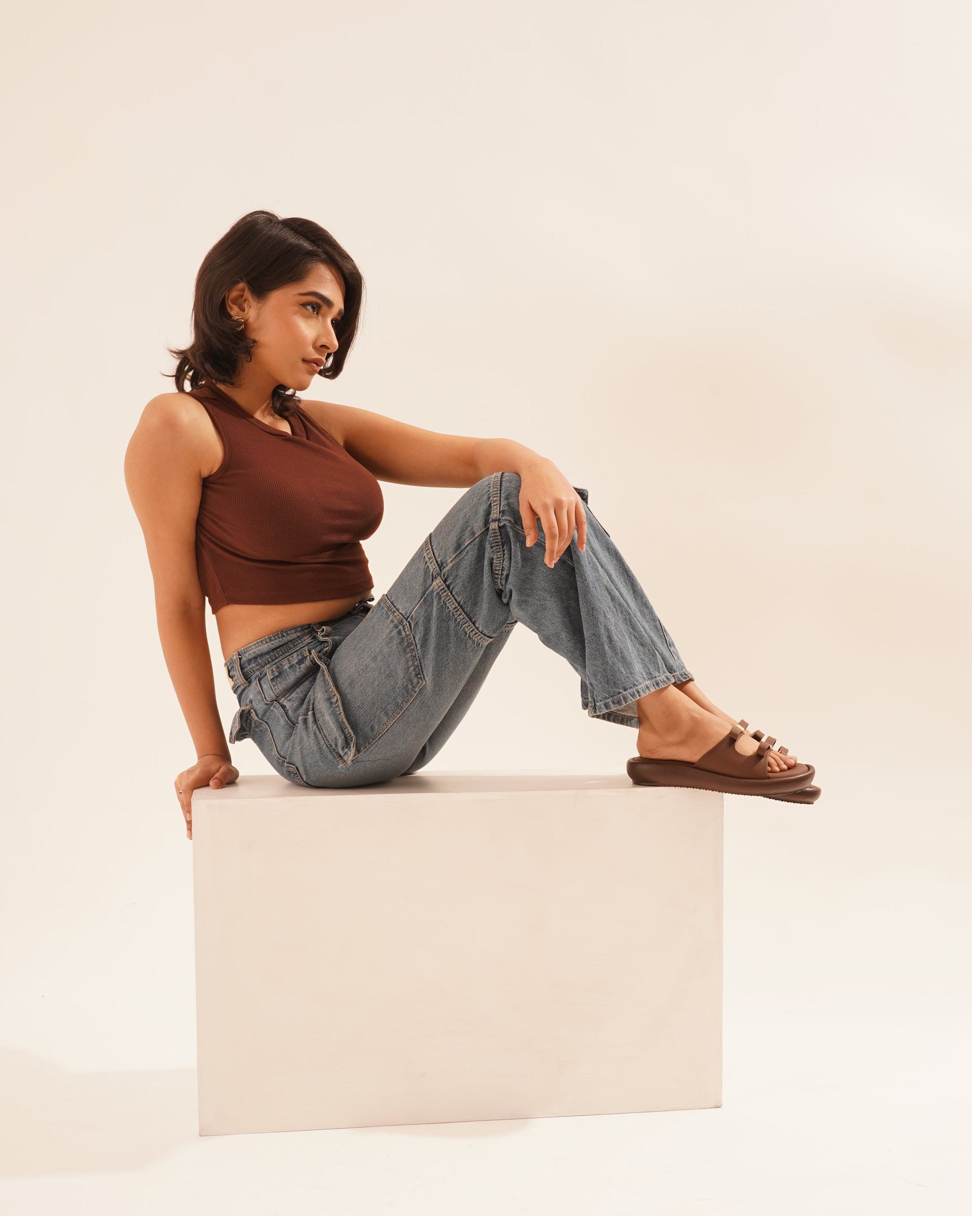 JM Looks slide sandals featuring multiple bow details on the wide straps and a flat sole
 Brown