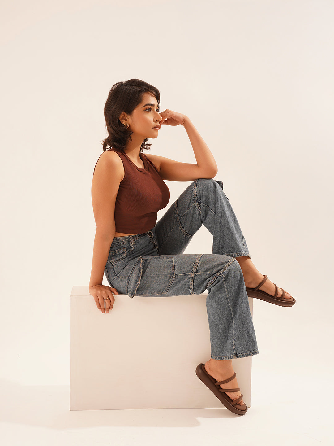 open-toe flat sandals with multiple slender straps across the forefoot
 Brown