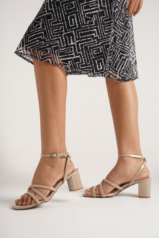 Jm Looks strappy block heel sandals with a patterned dress
 Cream