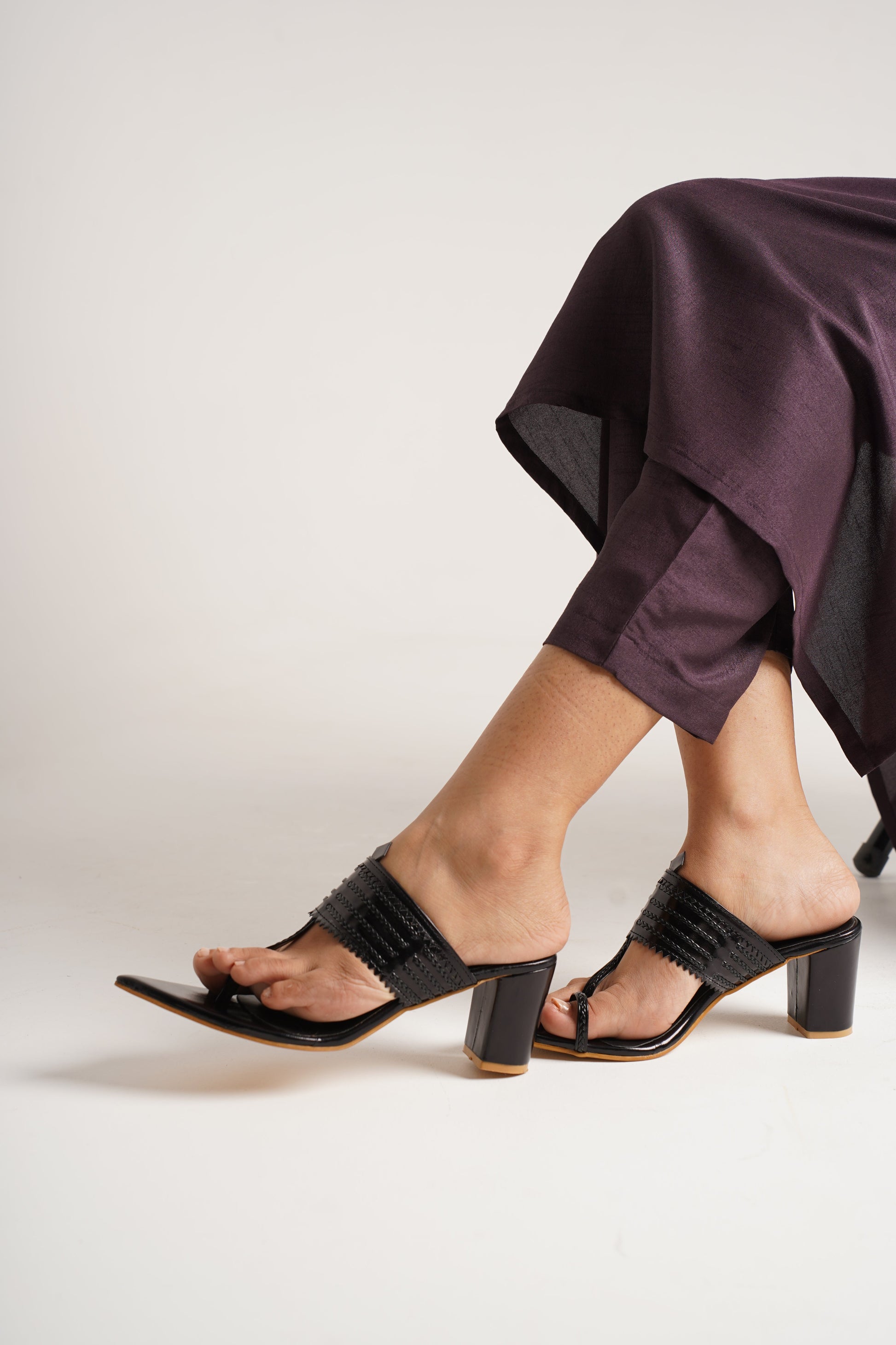 classic toe-ring block heels with a structured upper design
 Black