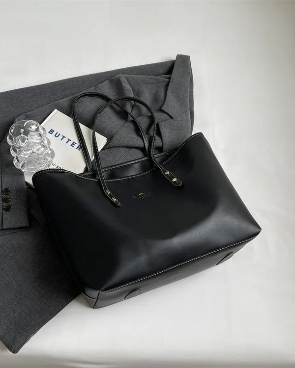 Large tote shoulder bag for women with top zip closure in cream faux leather, black handles