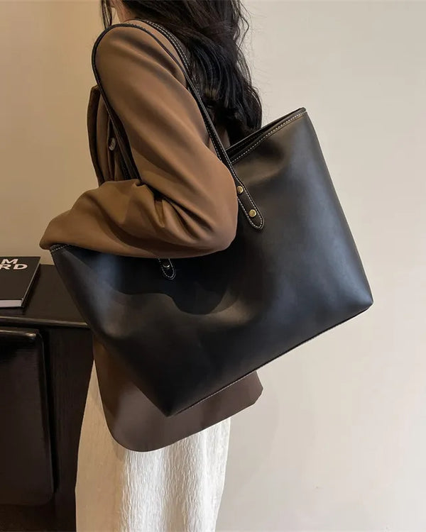 Large tote shoulder bag for women with top zip closure in cream faux leather, black handles