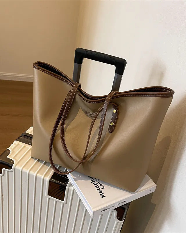 Large tote shoulder bag for women with top zip closure in cream faux leather, beige handles