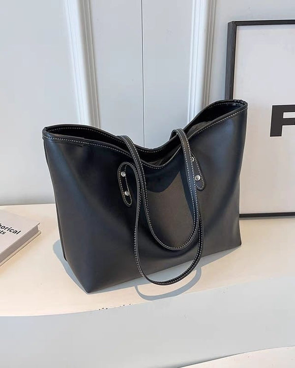 Large tote shoulder bag for women with top zip closure in cream faux leather, black handles
