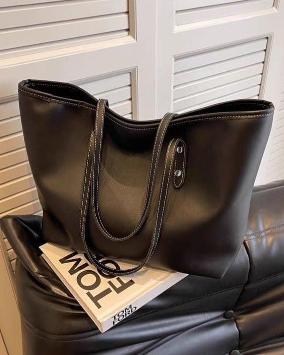 Large tote shoulder bag for women with top zip closure in cream faux leather, black handles