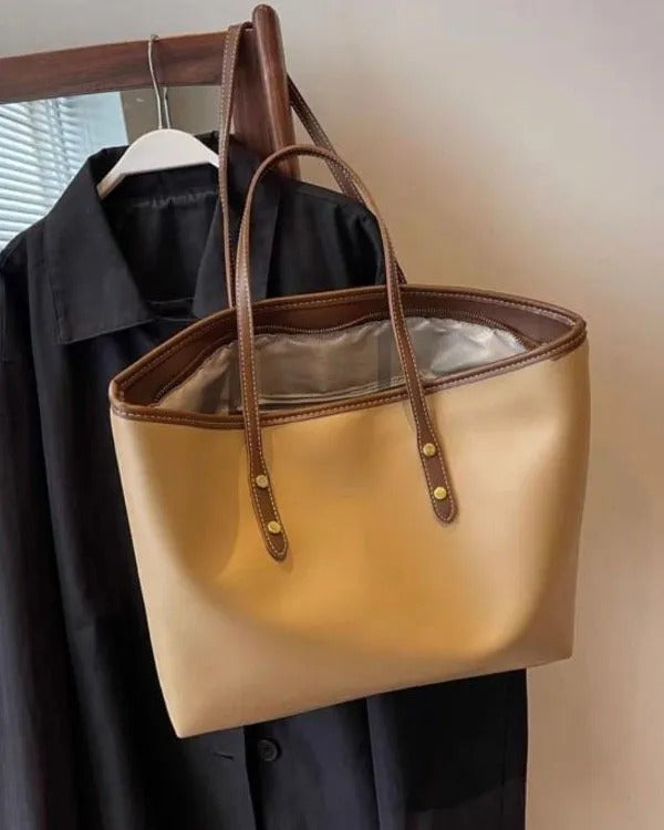 Large tote shoulder bag for women with top zip closure in cream faux leather, beige handles