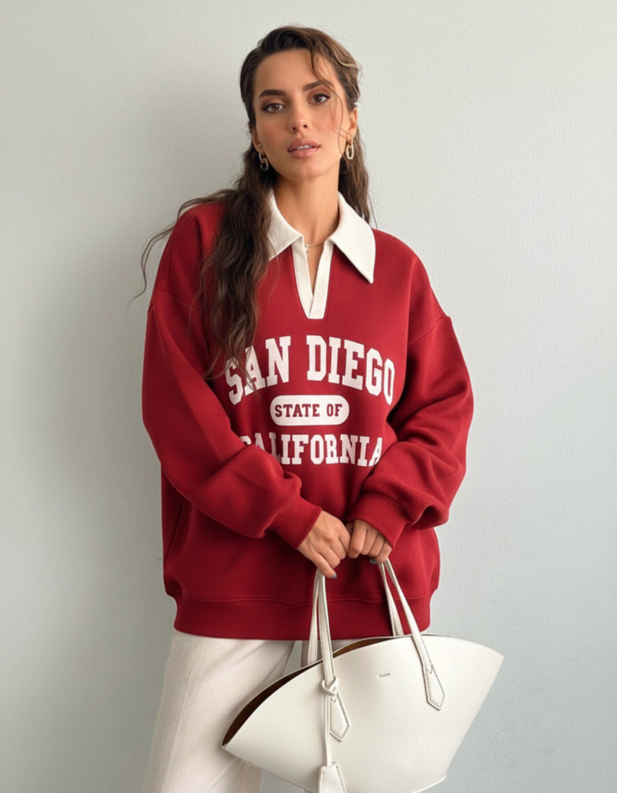 Collared sweatshirt for women in red with contrast white polo collar and San Diego varsity