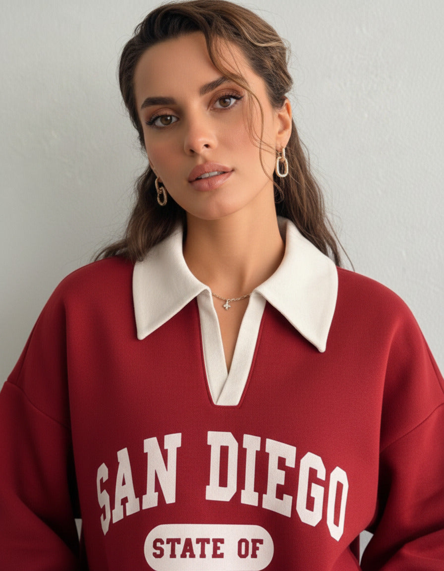 Collared sweatshirt for women in red with contrast white polo collar and San Diego varsity