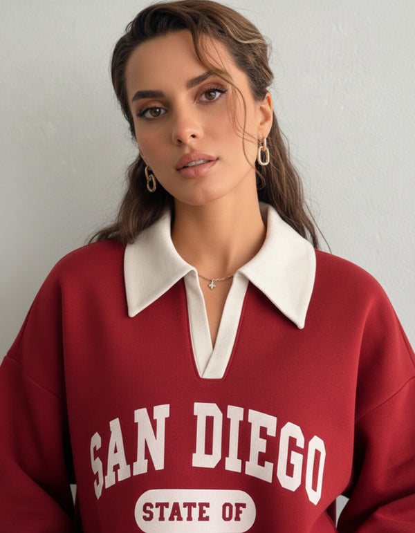 Collared sweatshirt for women in red with contrast white polo collar and San Diego varsity