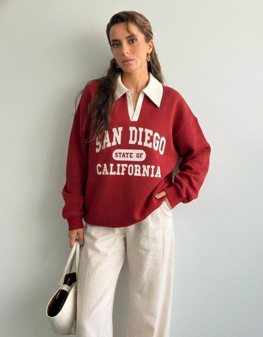 Collared sweatshirt for women in red with contrast white polo collar and San Diego varsity