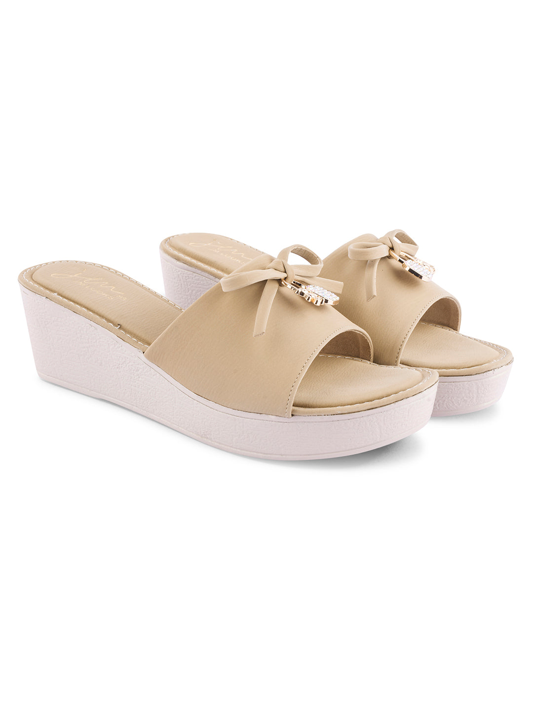 Jm Looks wedge slides with a decorative bow on the strap
 Beige