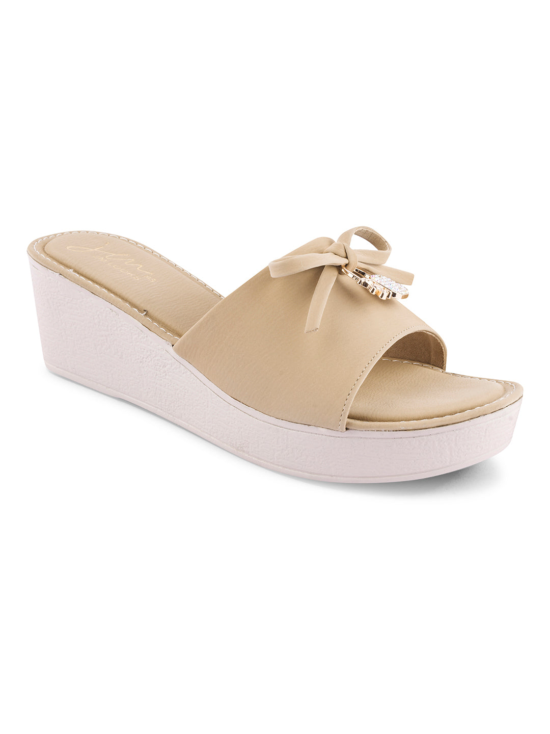 Jm Looks wedge slides with a decorative bow on the strap
 Beige
