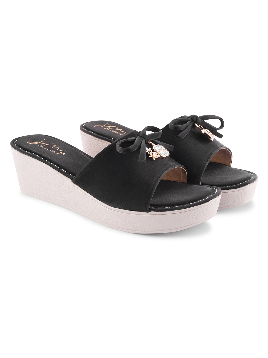 Jm Looks wedge slides with a decorative bow on the strap
 Black