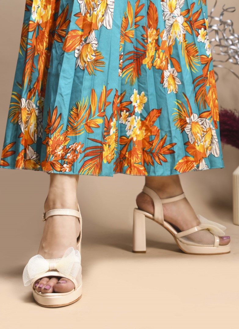 Jm Looks platform heels with a sheer bow detail on the front strap and an ankle strap
 White