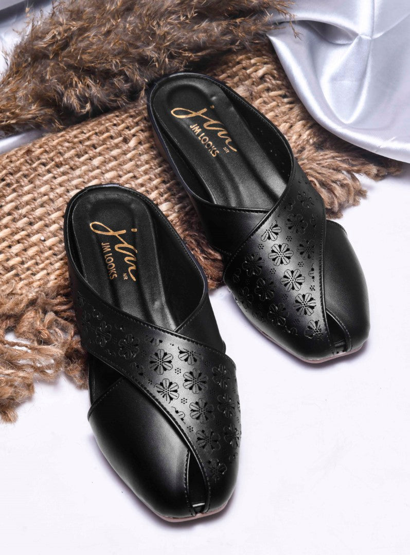 JM Looks women's mules with laser-cut cross straps and a closed toe
 Black