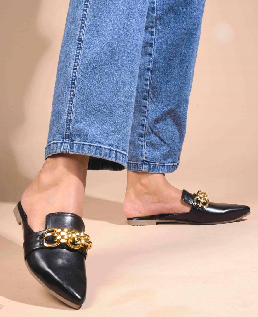 JM Looks women's pointed-toe mules featuring a bold metallic chain detail on the strap
 Black