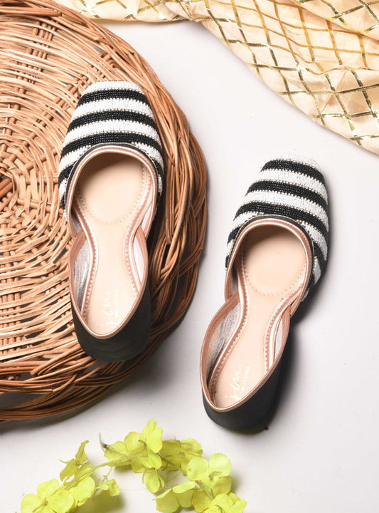Jm Looks juttis featuring a black and white striped beaded pattern
 Black