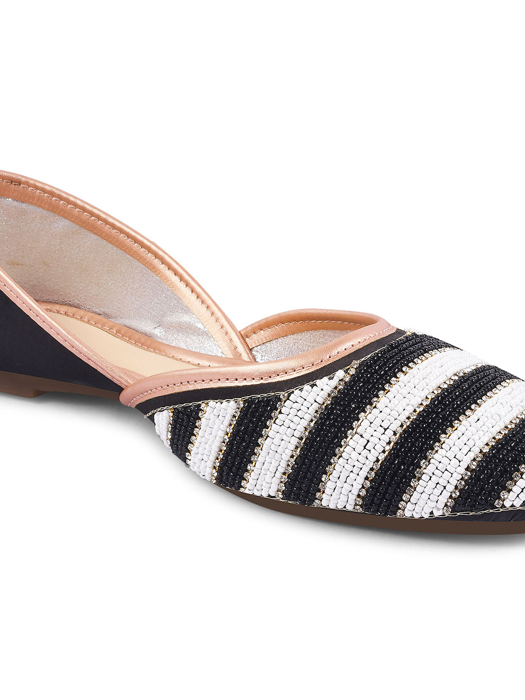Jm Looks juttis featuring a black and white striped beaded pattern
 Black