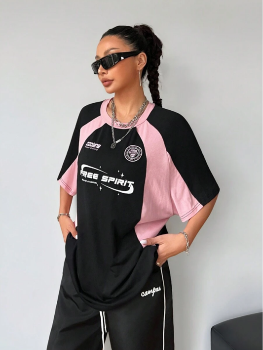 Oversized streetwear graphic t-shirt in black with pink side panels and bold typography front back design