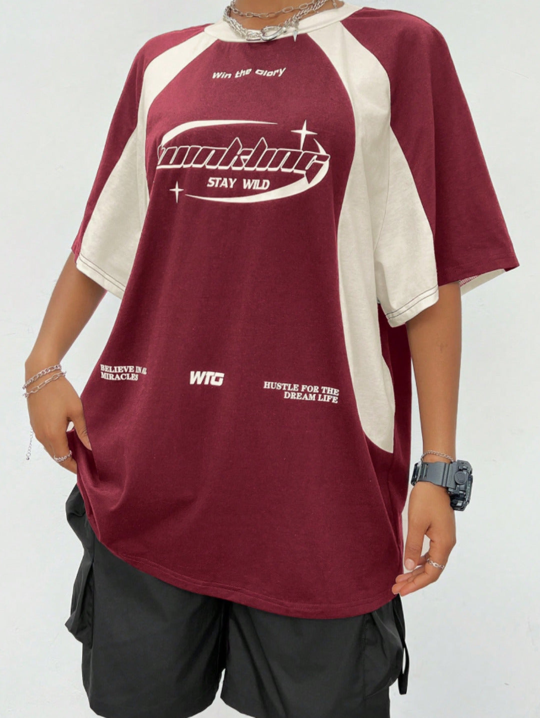 Oversized colorblock t-shirt for women in maroon and cream with graphic text print and drop shoulders