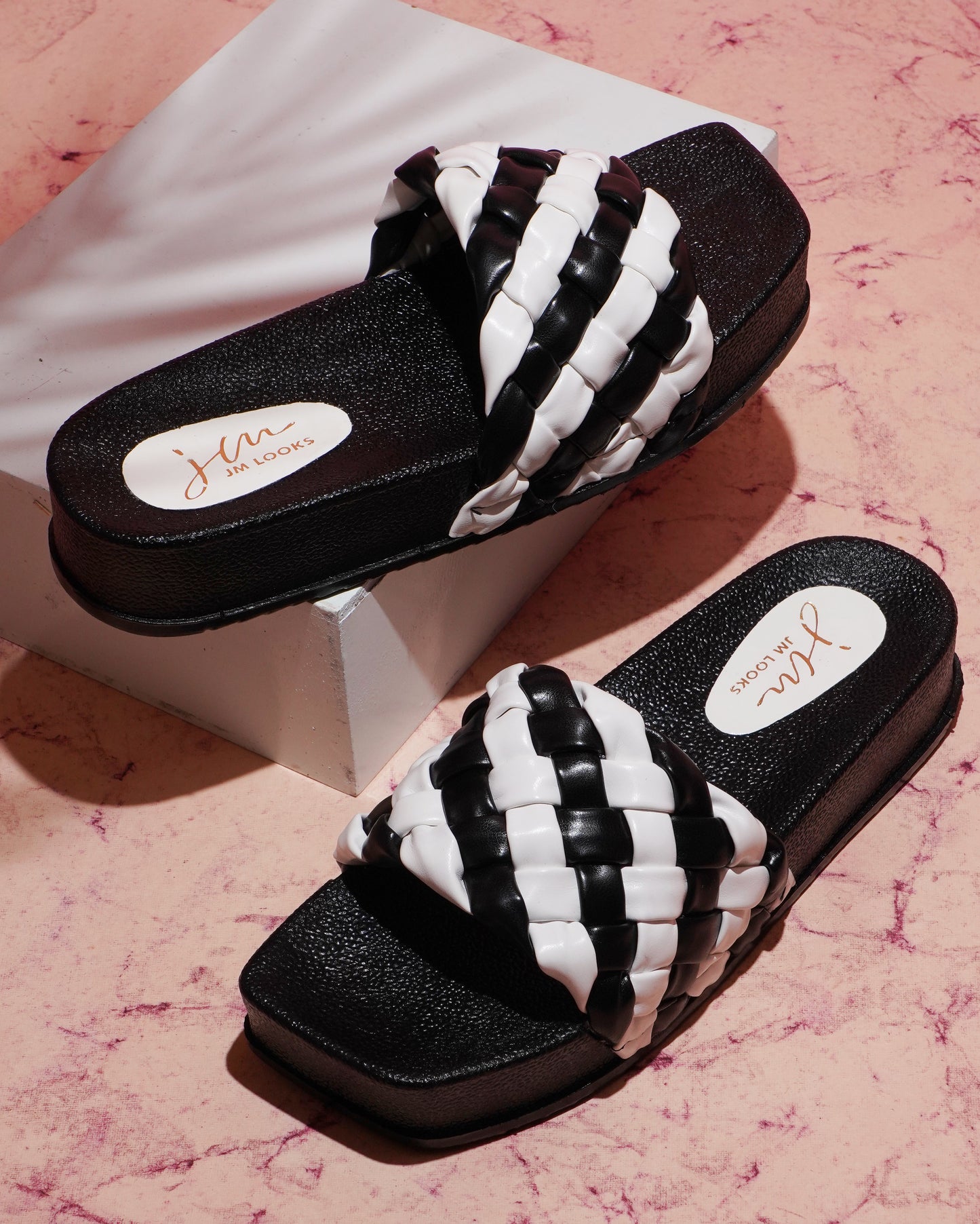 Jm Looks platform slides with a distinctive braided strap
 Black