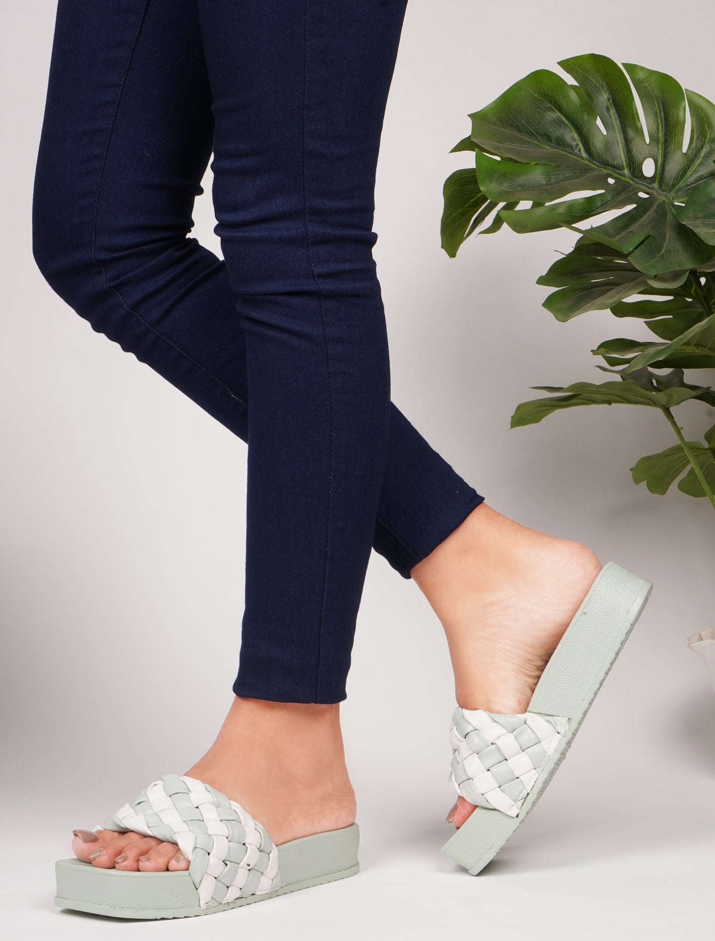 Jm Looks platform slides with a distinctive braided strap
 See Green