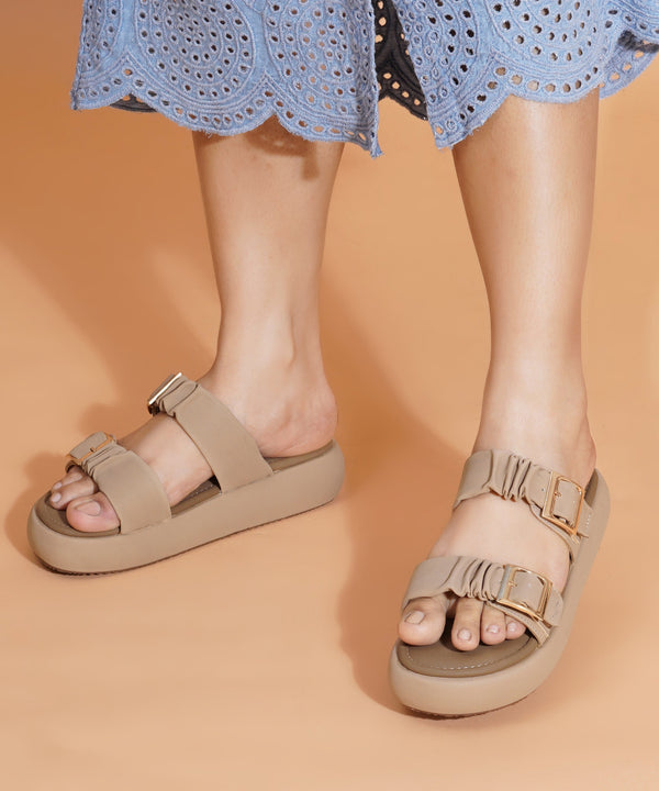 Platform sandals for women in beige with ruched dual straps, gold buckles and thick cushioned footbed