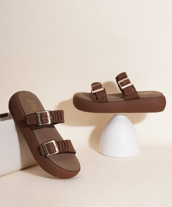 Platform sandals for women in brown with ruched dual straps, gold buckles and thick cushioned footbed