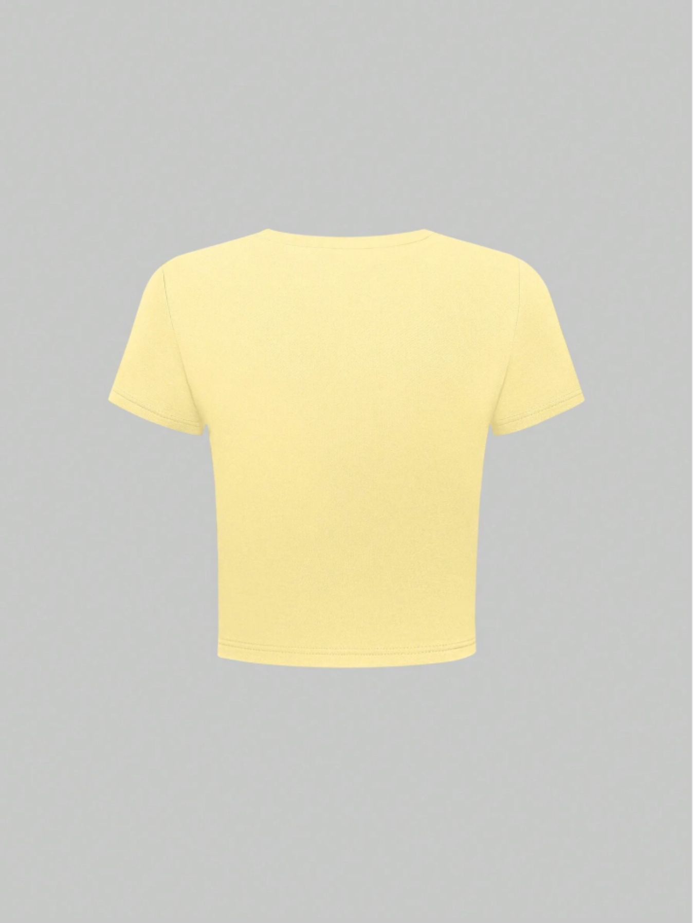 Floral crop t-shirt for women featuring pink hibiscus print, round neck, short sleeves, yellow cotton fabric