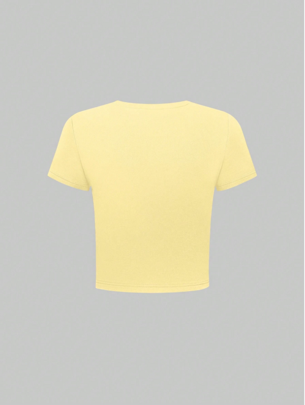 Floral crop t-shirt for women featuring pink hibiscus print, round neck, short sleeves, yellow cotton fabric