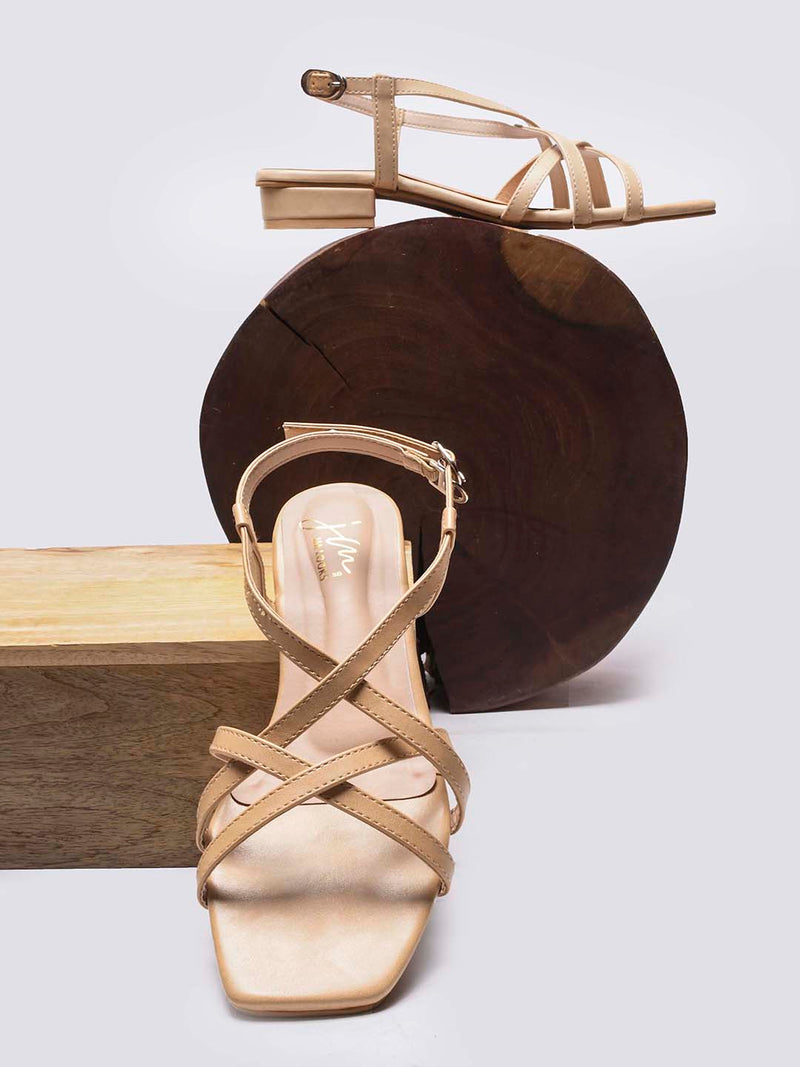 low block heel sandals with multiple straps and an adjustable ankle strap
 Beige
