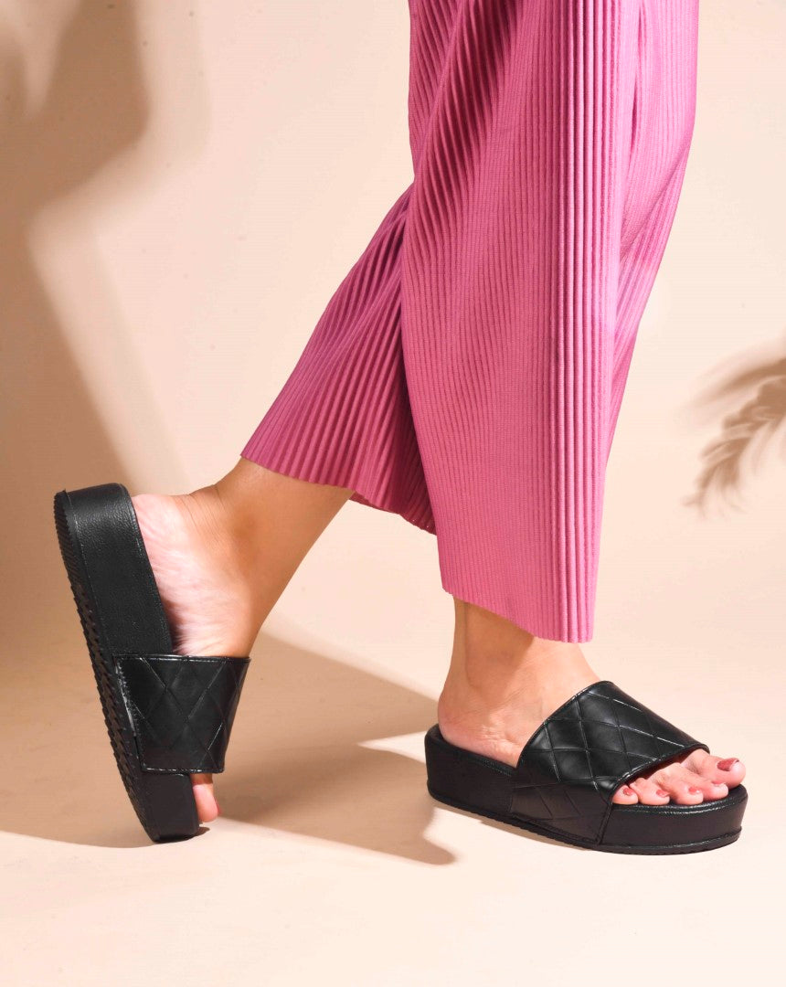 women's platform slides with a quilted upper strap
 Black