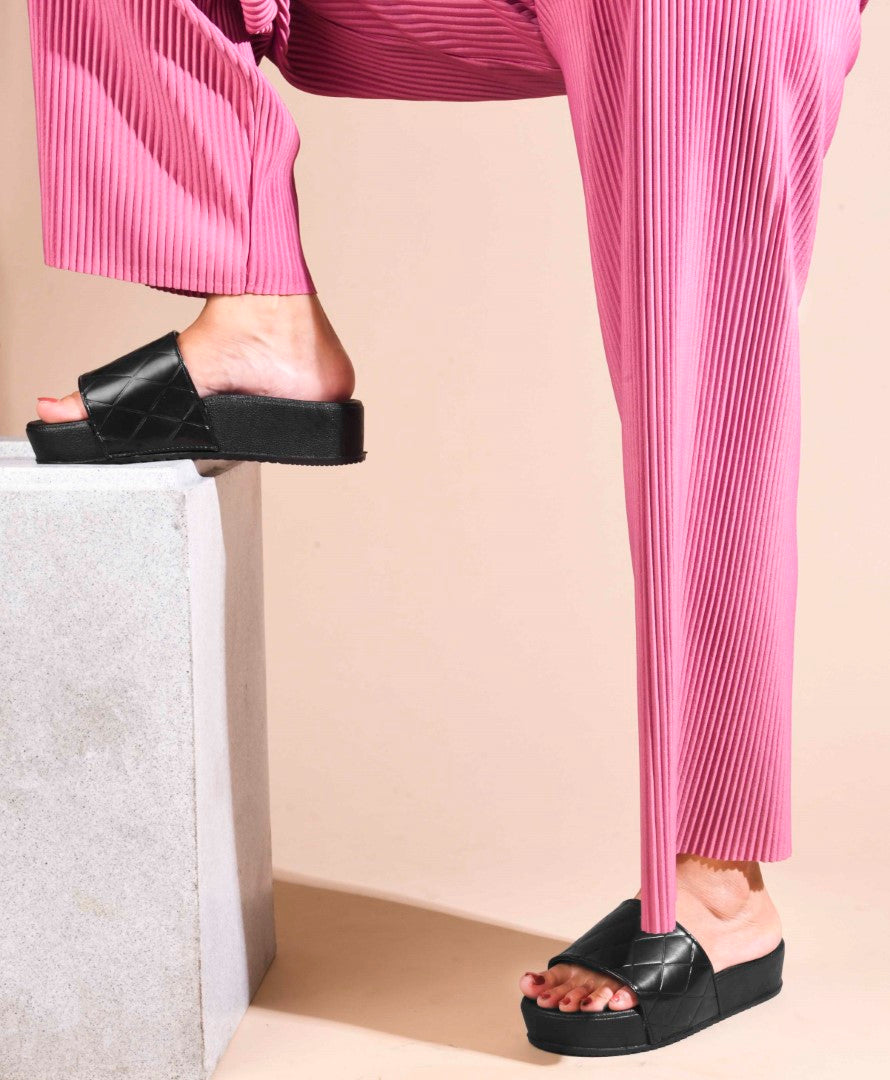 women's platform slides with a quilted upper strap
 Black