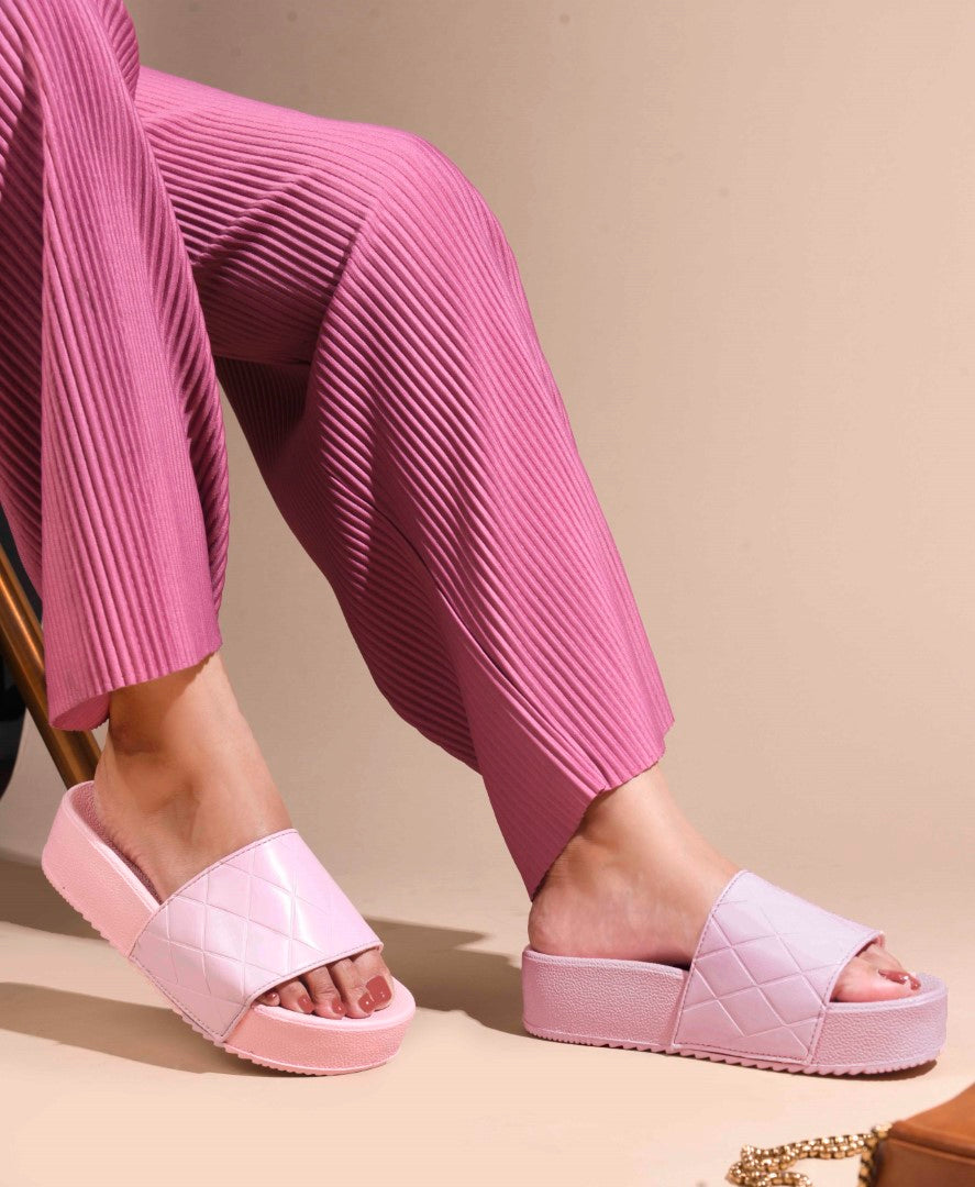 women's platform slides with a quilted upper strap
 Pink