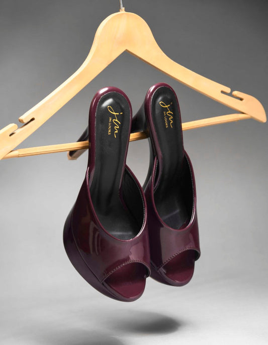 open-toe platform mules with a glossy patent finish and a high heel
 Cherry