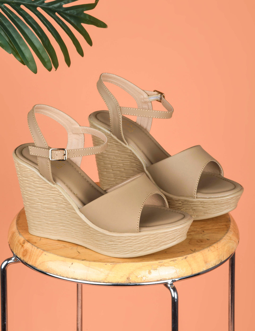 Beige peep-toe wedge heels with ankle buckle strap