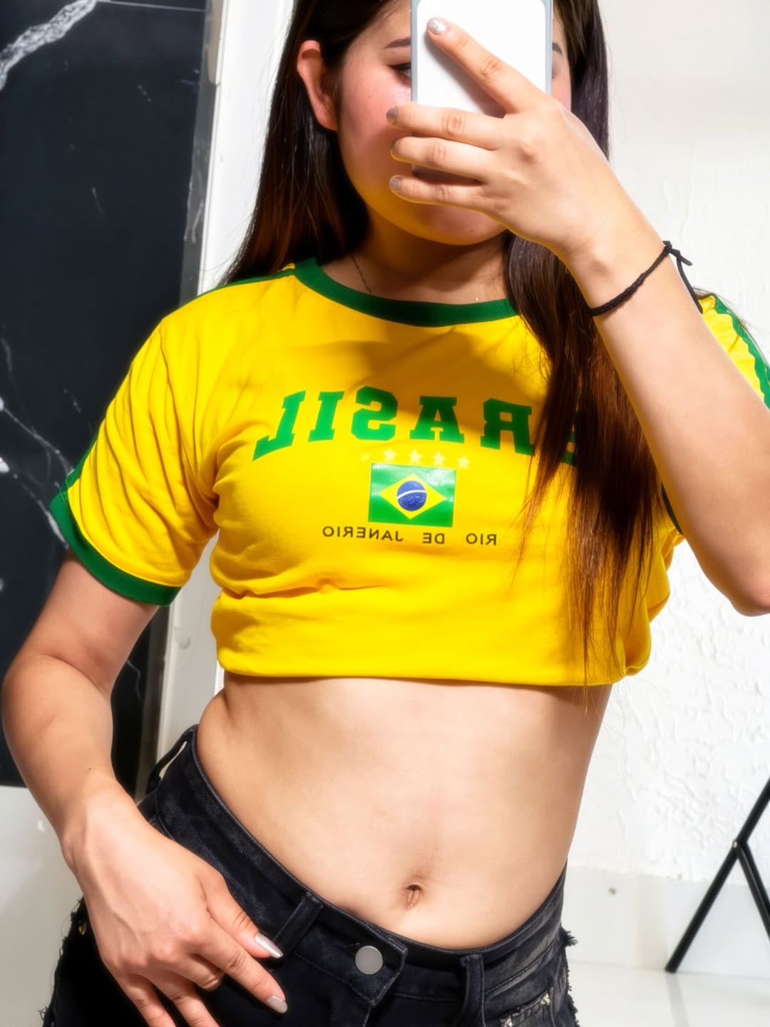 Yellow Brasil printed crop top with green ribbed trims, side stripes, flag graphic, and short sleeves