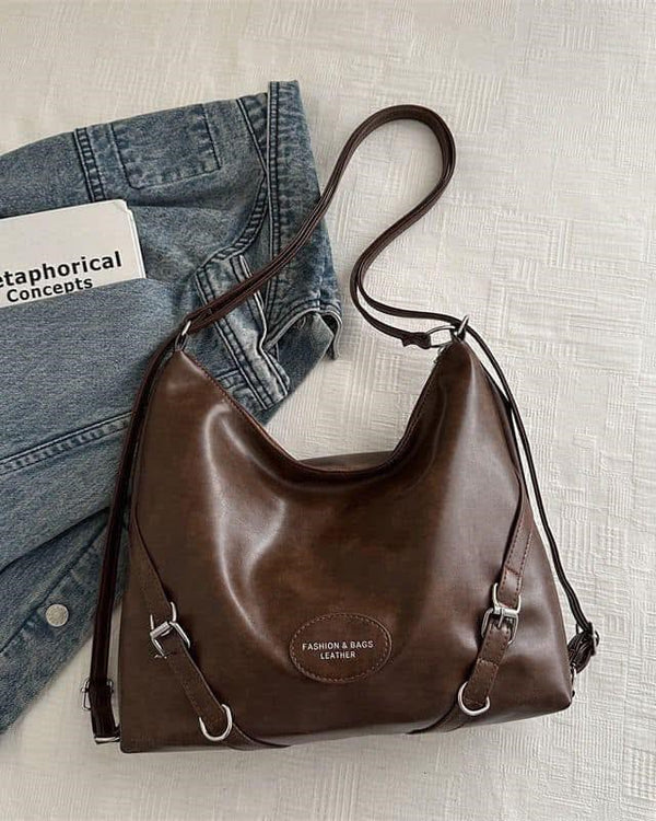 Coffee slouchy hobo shoulder bag in sumptuous distressed leather with silver hardware and adjustable crossbody straps