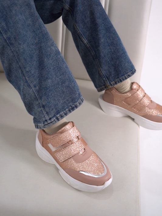 Glitter sneakers for women in Peach with dual velcro straps, white platform sole, silver toe.