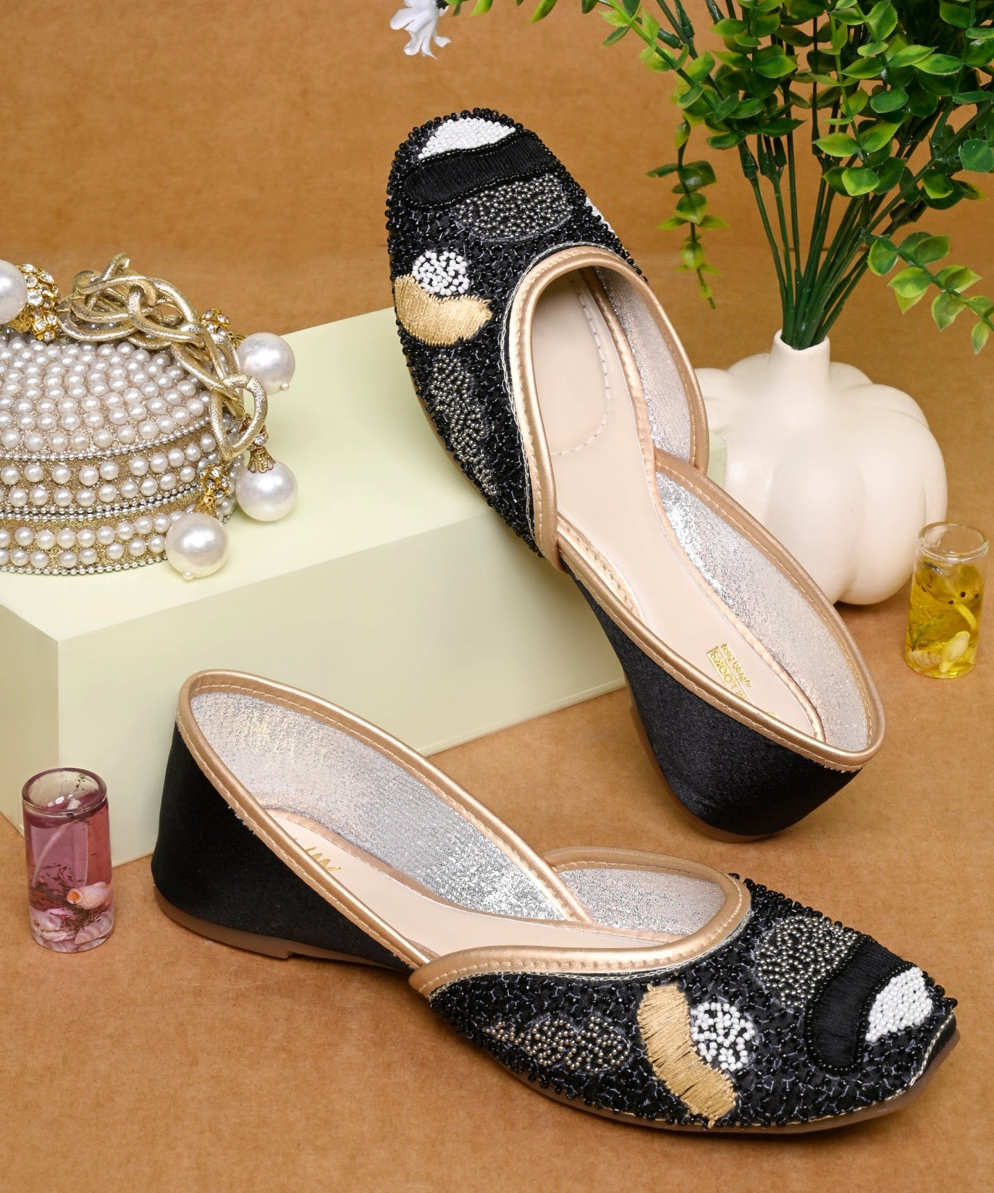 Black pearl beaded ethnic jutti for women with golden piping, black bead detailing, pointed toe flat