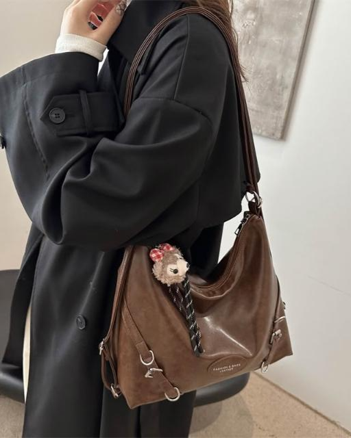 Brown slouchy hobo shoulder bag in sumptuous distressed leather with silver hardware and adjustable crossbody straps