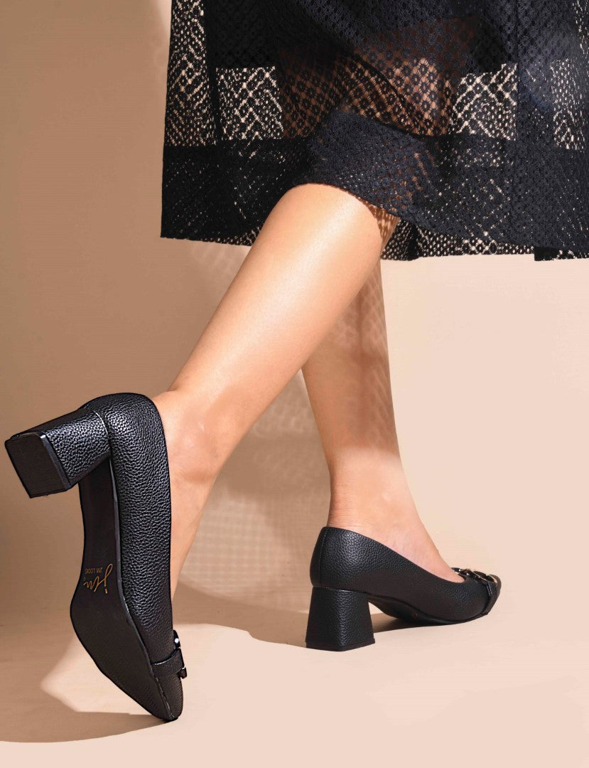 women's block heel pumps featuring a pointed toe and a decorative buckle embellishment
 Black