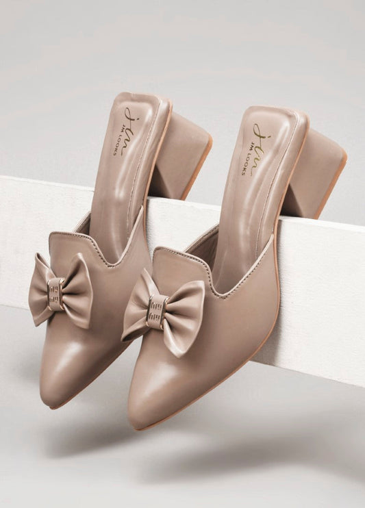 JM Looks women's pointed-toe mules with a decorative bow and a block heel
 Beige
