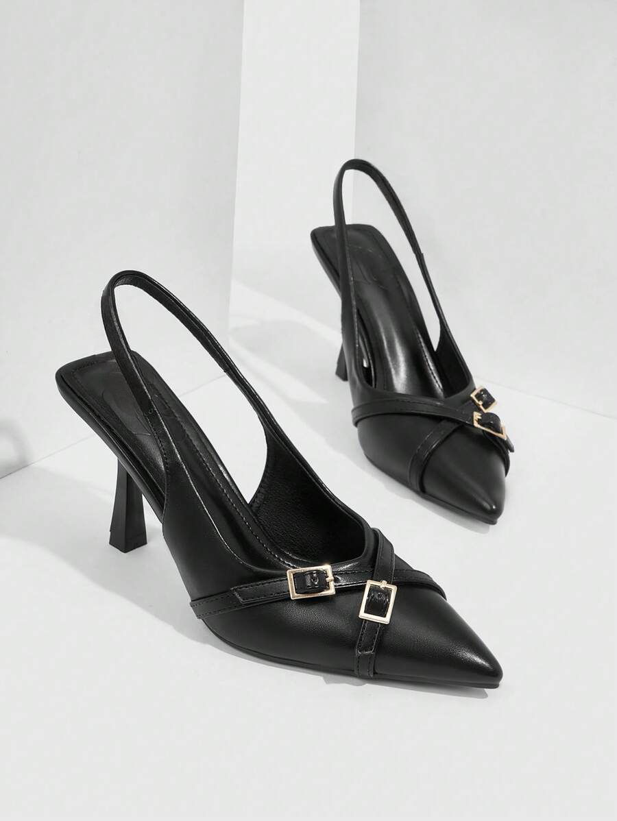 A pointed-toe slingback heel with strap and buckle details on the vamp and an adjustable strap
 Black