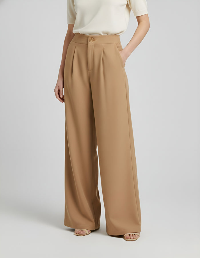 Wide leg pleated trousers in beige, high waisted with button closure, soft front pleats, flowy drape