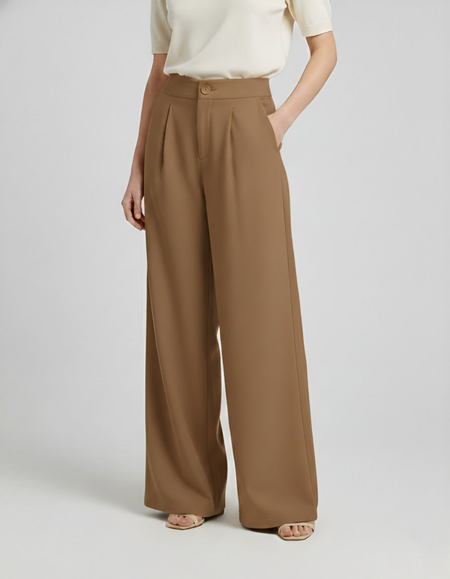 Wide leg pleated trousers in brown, high waisted with button closure, soft front pleats, flowy drape