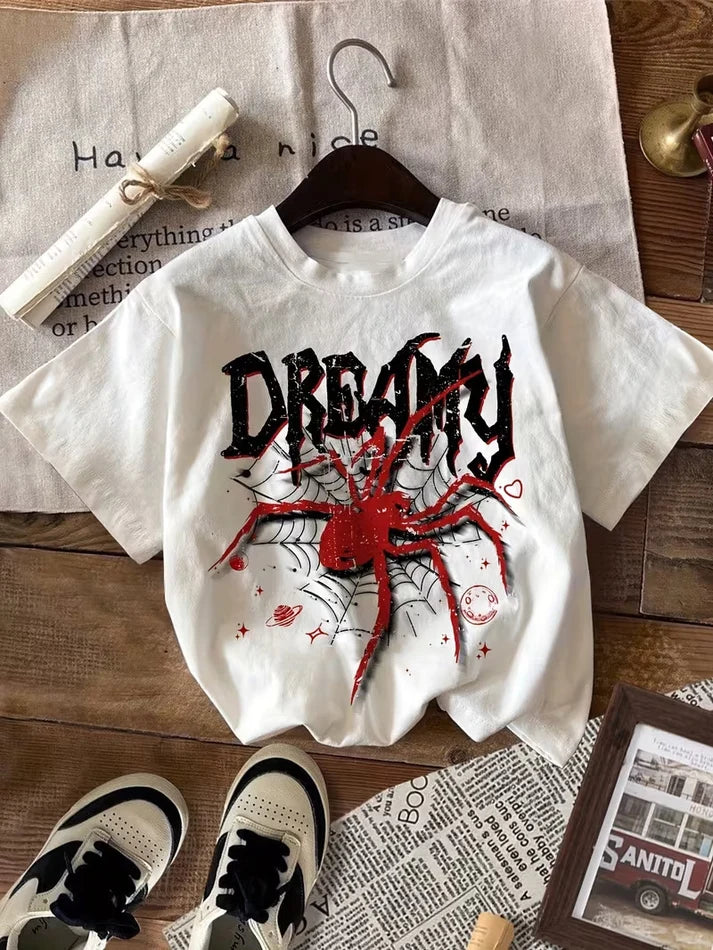 White graphic t-shirt for women with gothic "Dreamy" text and a red spider web print