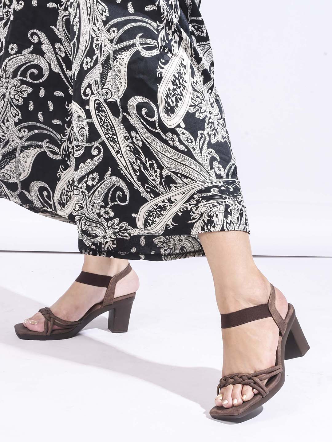 women's block heel sandals with intricate knotted and braided strap details
 Brown