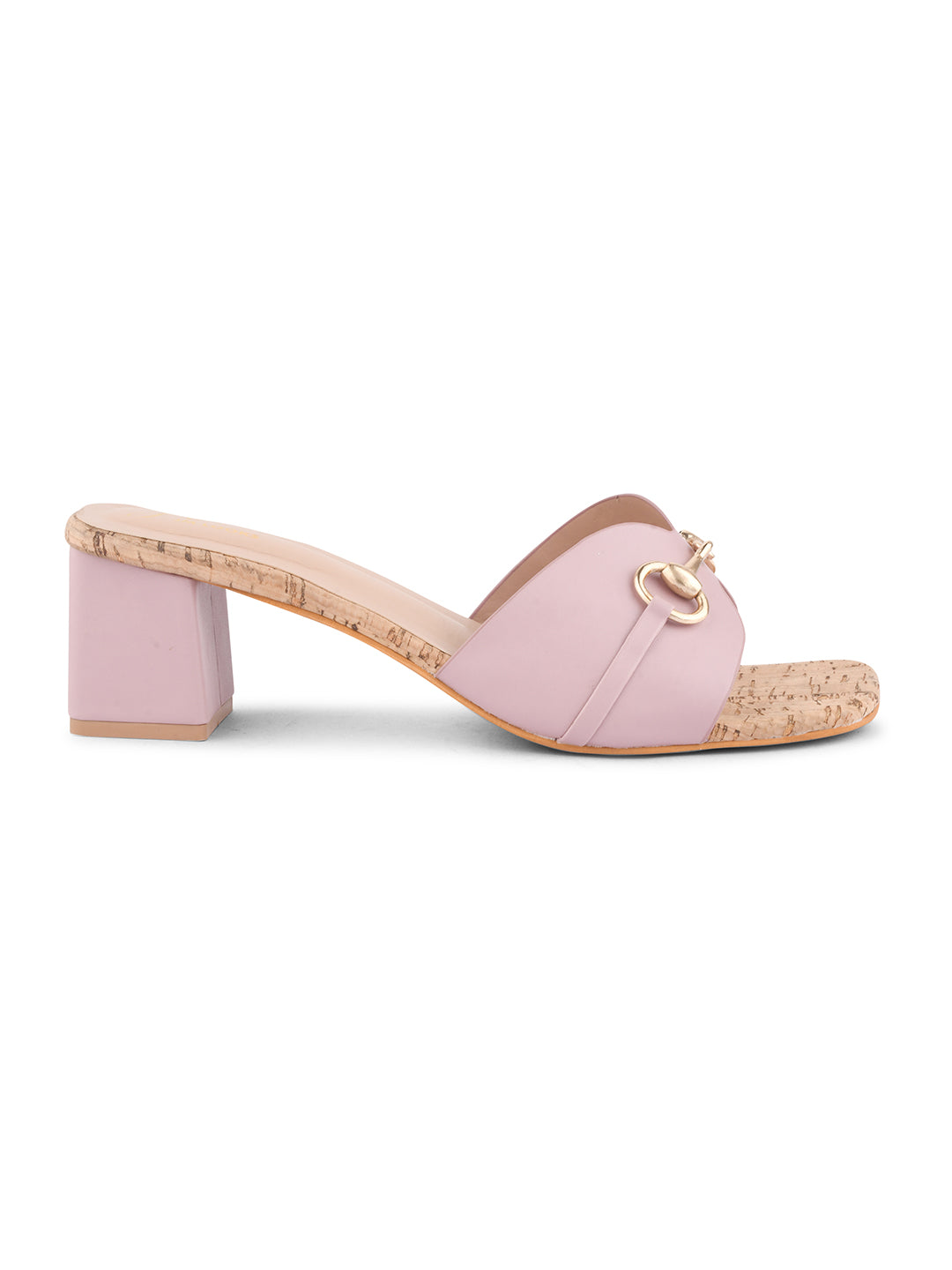women's mules featuring a wide strap with a buckle embellishment and a cork-textured block heel
 Peach