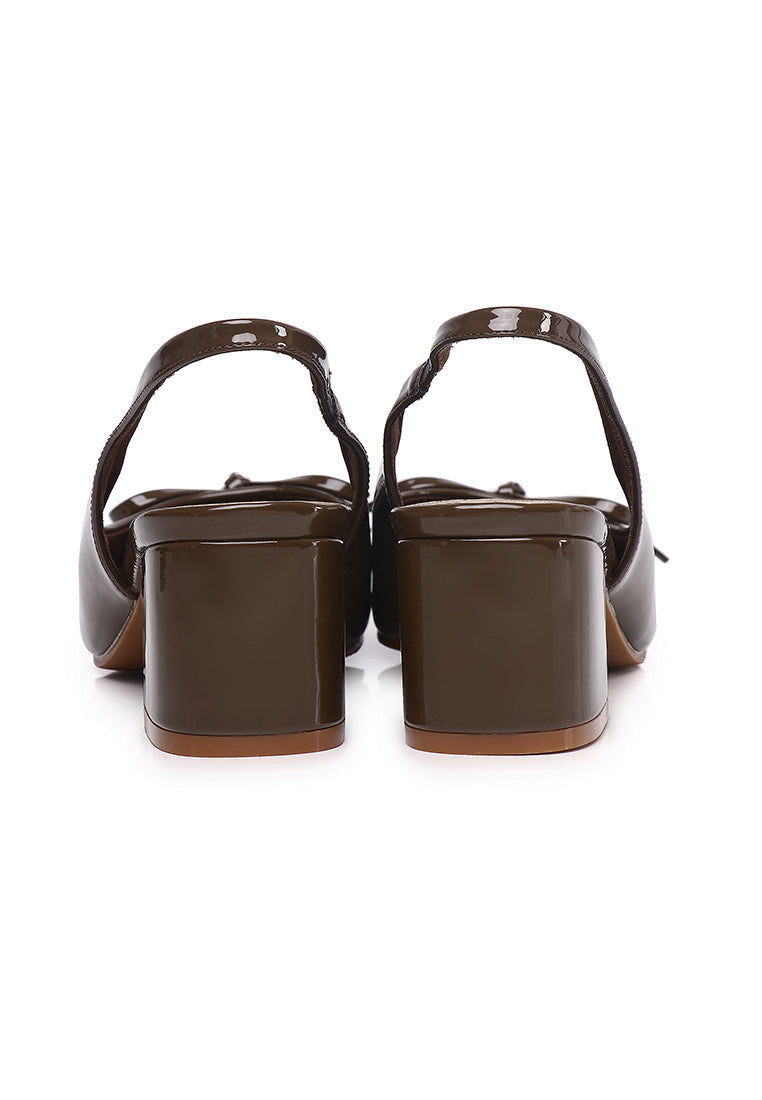 Women's brown patent Mary Jane slingback block heels with bow detail, square toe and chunky heel.